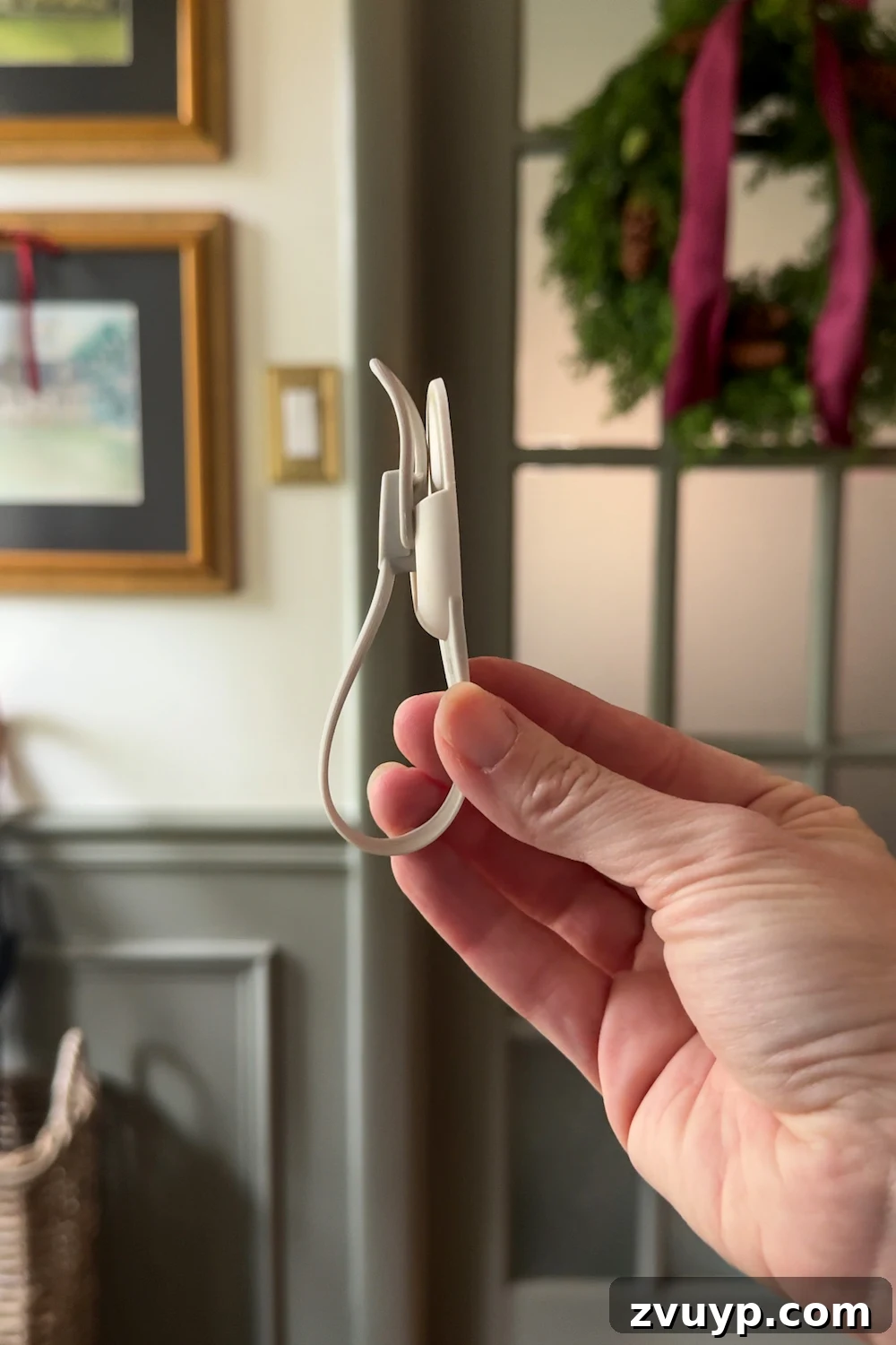 Hang Garland Over Any Doorway Damage-Free and Custom 5 how to hang doorway garland inside with no damage for Christmas