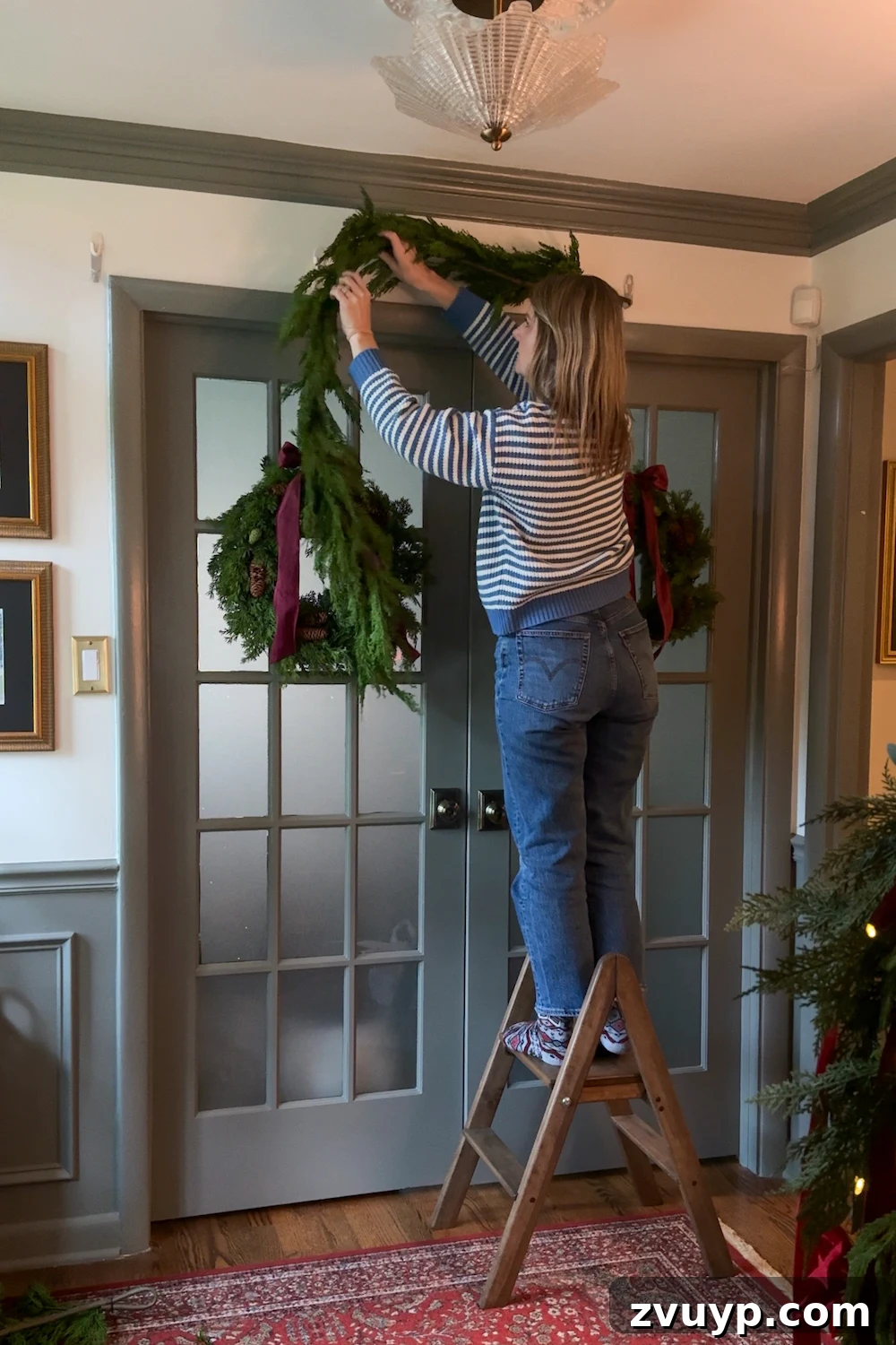 Hang Garland Over Any Doorway Damage-Free and Custom 6 how to hang doorway garland inside with no damage for Christmas