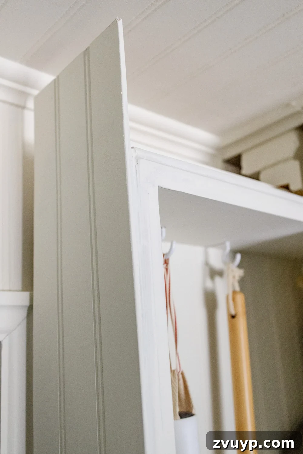 Crafting a Broom Cupboard That Disappears Into the Wall 11 hidden diy broom cupboard and cleaning supply storage in a laundry room