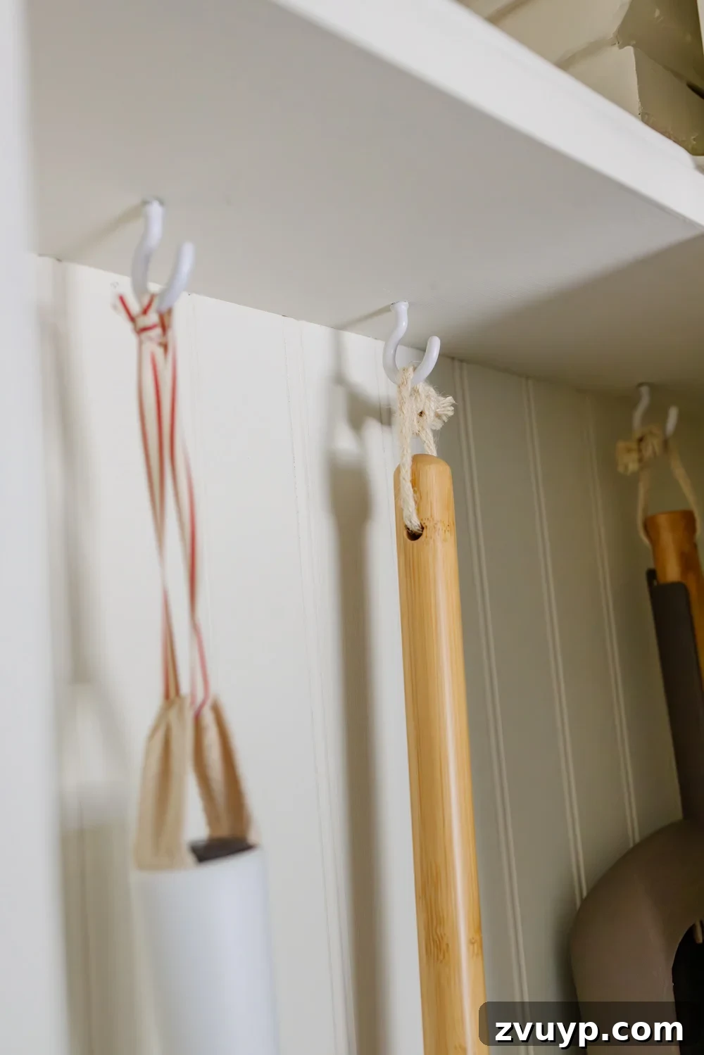 Crafting a Broom Cupboard That Disappears Into the Wall 14 hidden diy broom cupboard and cleaning supply storage in a laundry room