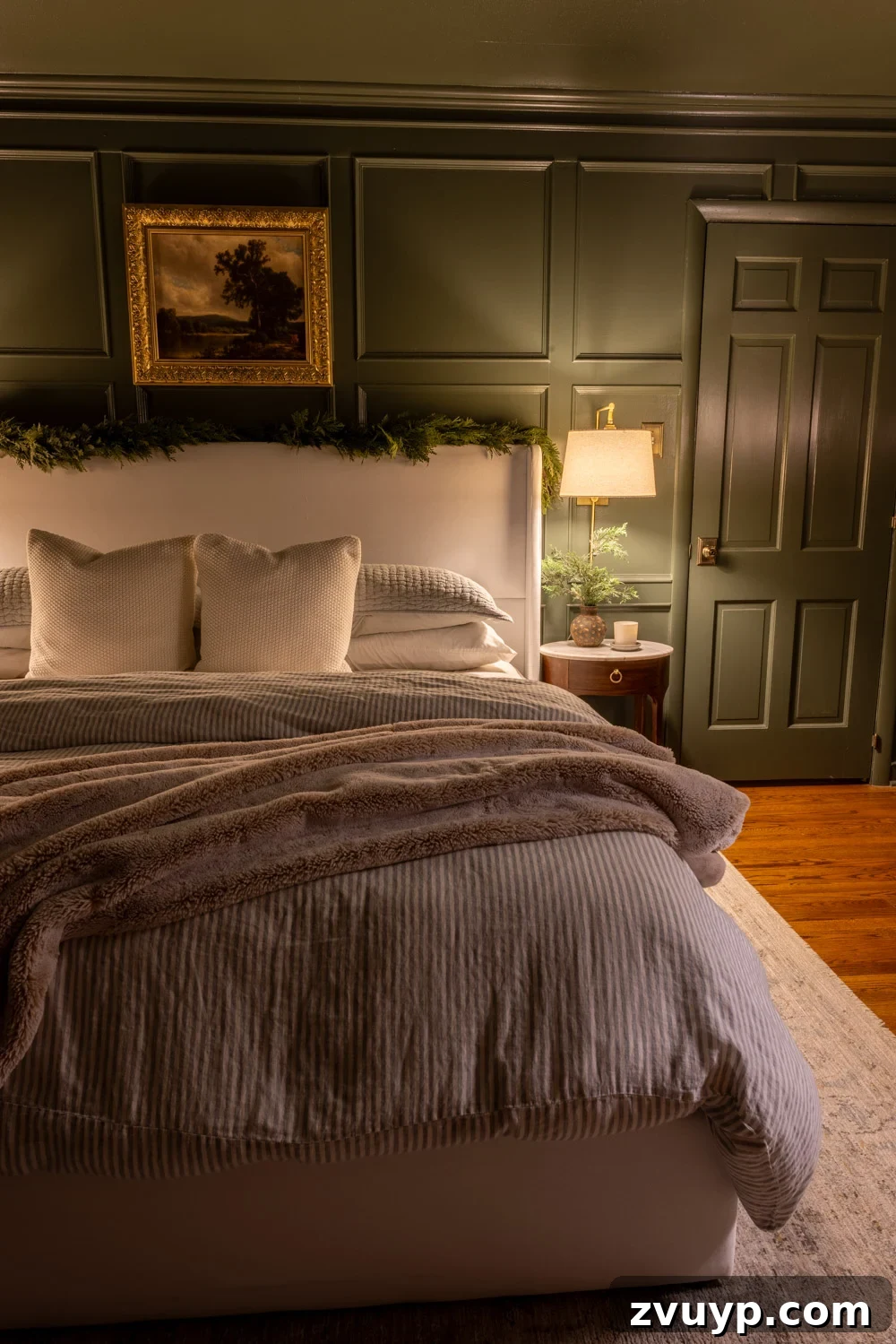 Enchanted Yuletide Candlelight Stroll 2025 22 Cozy primary bedroom with moody green walls and subtle Christmas decor