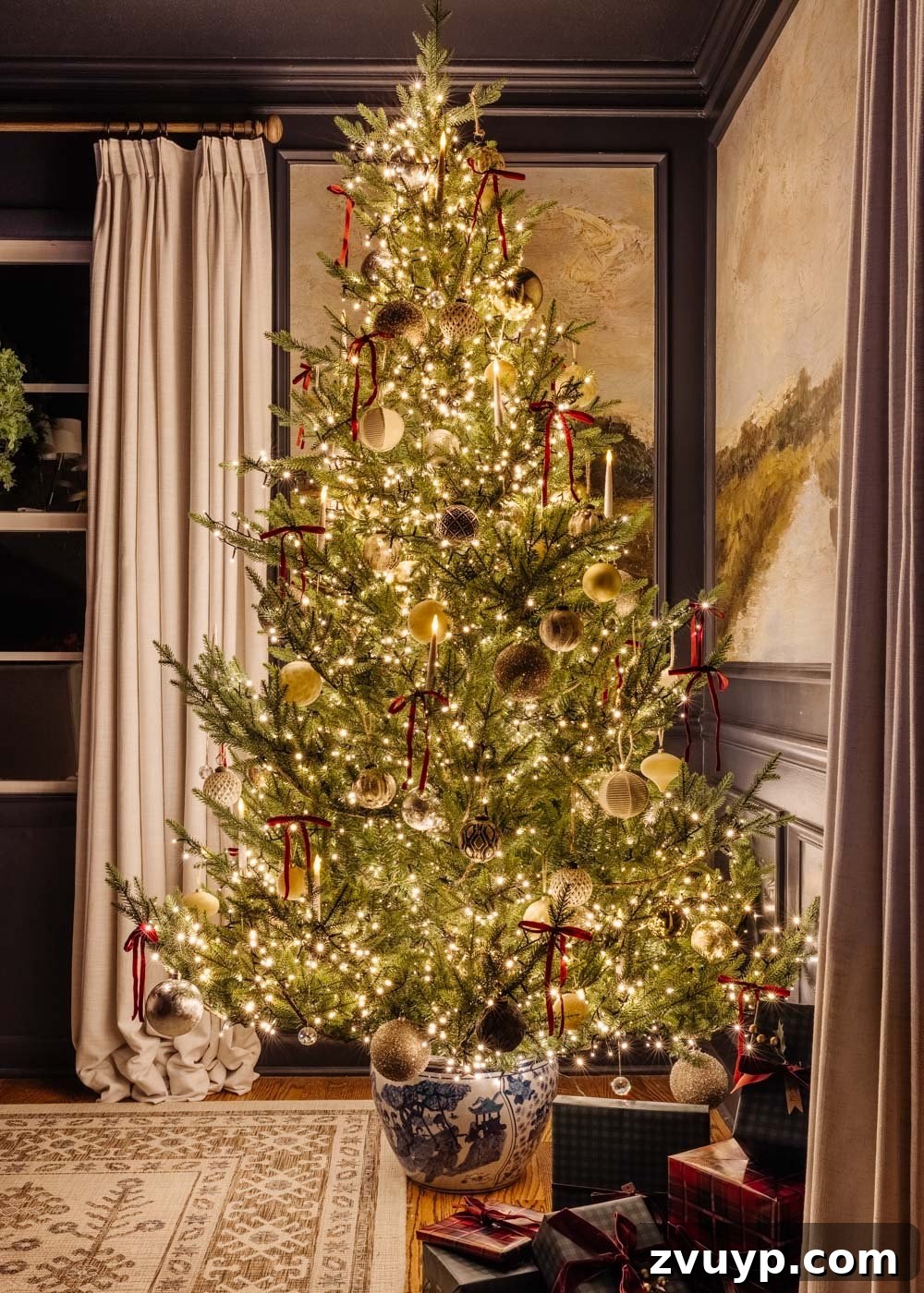 Enchanted Yuletide Candlelight Stroll 2025 8 Dining room Christmas tree glowing at night in a modern traditional home