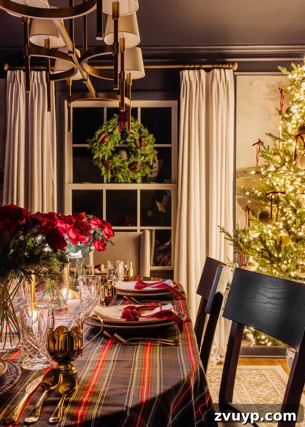 Enchanted Yuletide Candlelight Stroll 2025 9 Dining room showing elegant Christmas decor and a glowing tree at night
