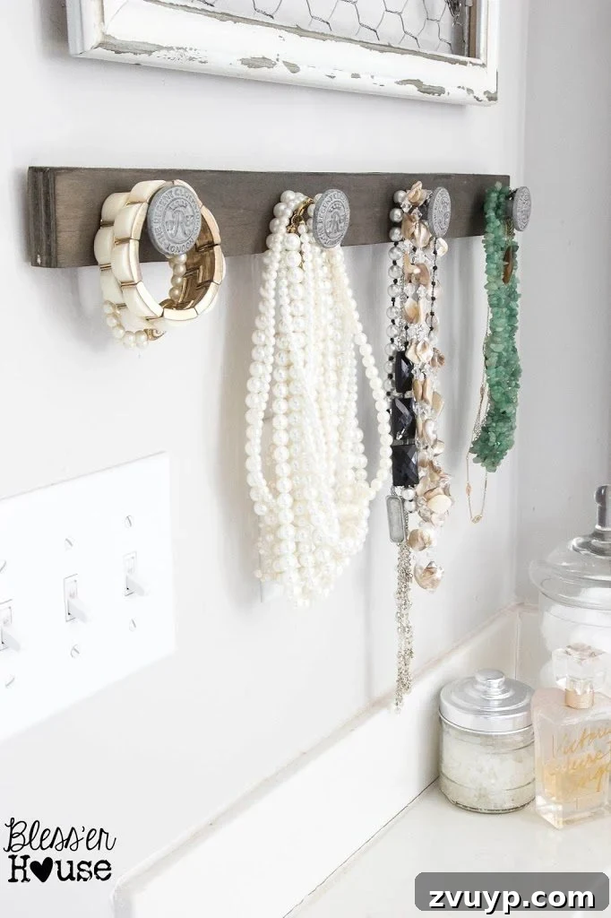 Organized Jewelry on Wall in Rustic Industrial Bathroom