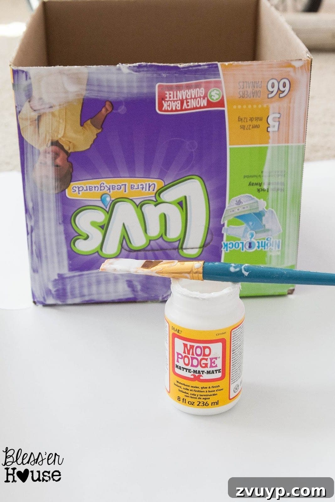 Applying Faux Wood Paper with Mod Podge