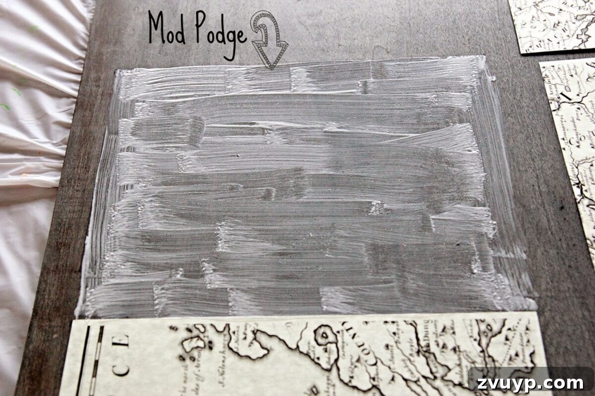 Pencil markings on plywood for map page placement.