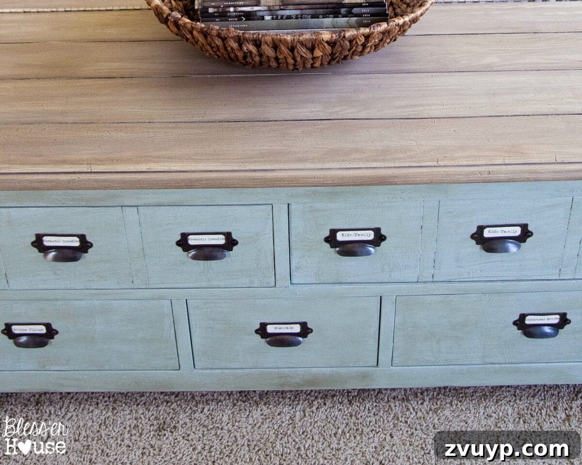 Angled view of the Faux Planked Card Catalog Coffee Table, highlighting the waxed finish and hardware.