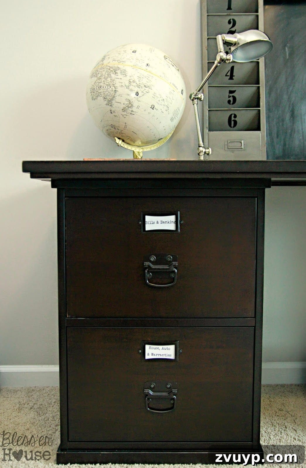 Close-up view of neatly organized file drawers with labeled hanging folders, ready for efficient document management.