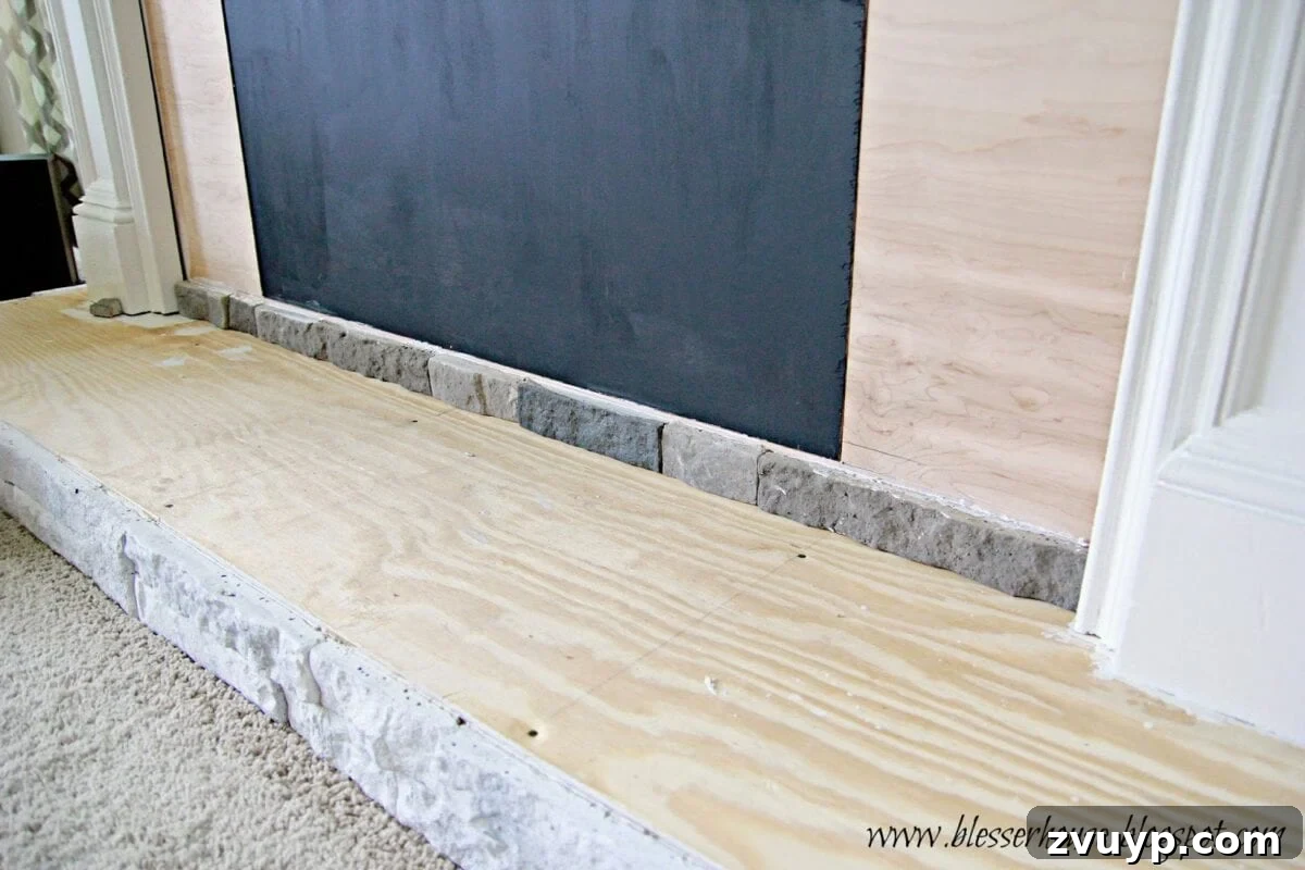 DIY Faux Fireplace Media Console: Finishing the Project 14 Airstone Installation on Fireplace Surround