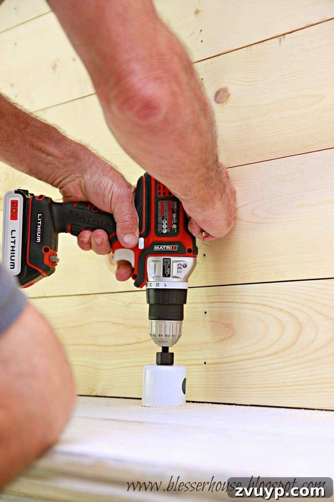Hole drilled in mantel shelf for cord management