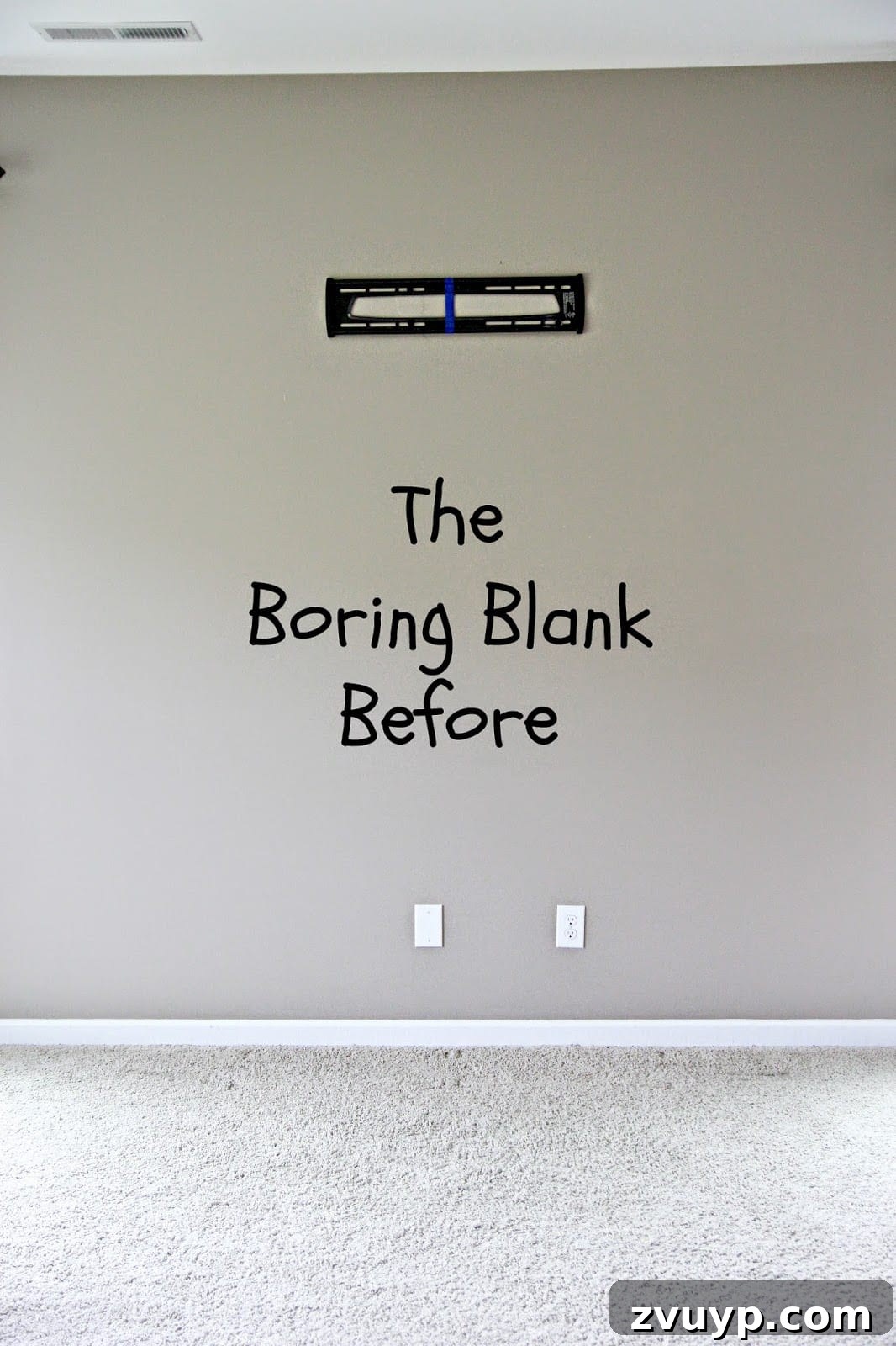 Empty wall before faux fireplace installation