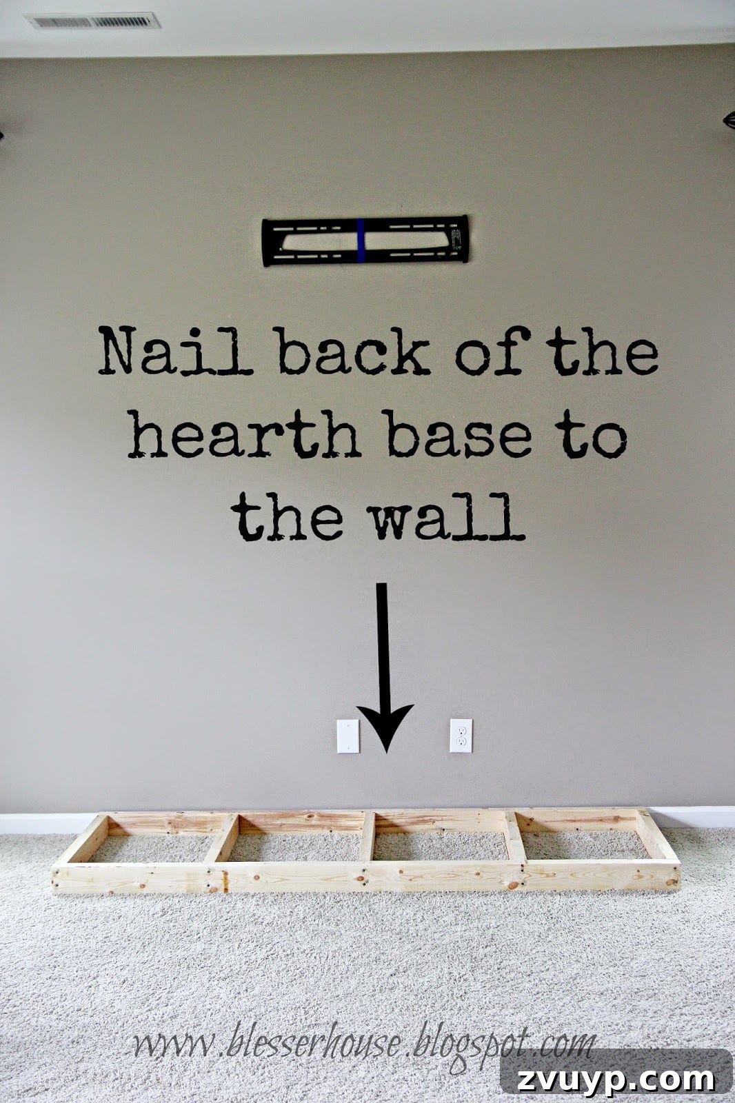 Hearth base anchored to the wall