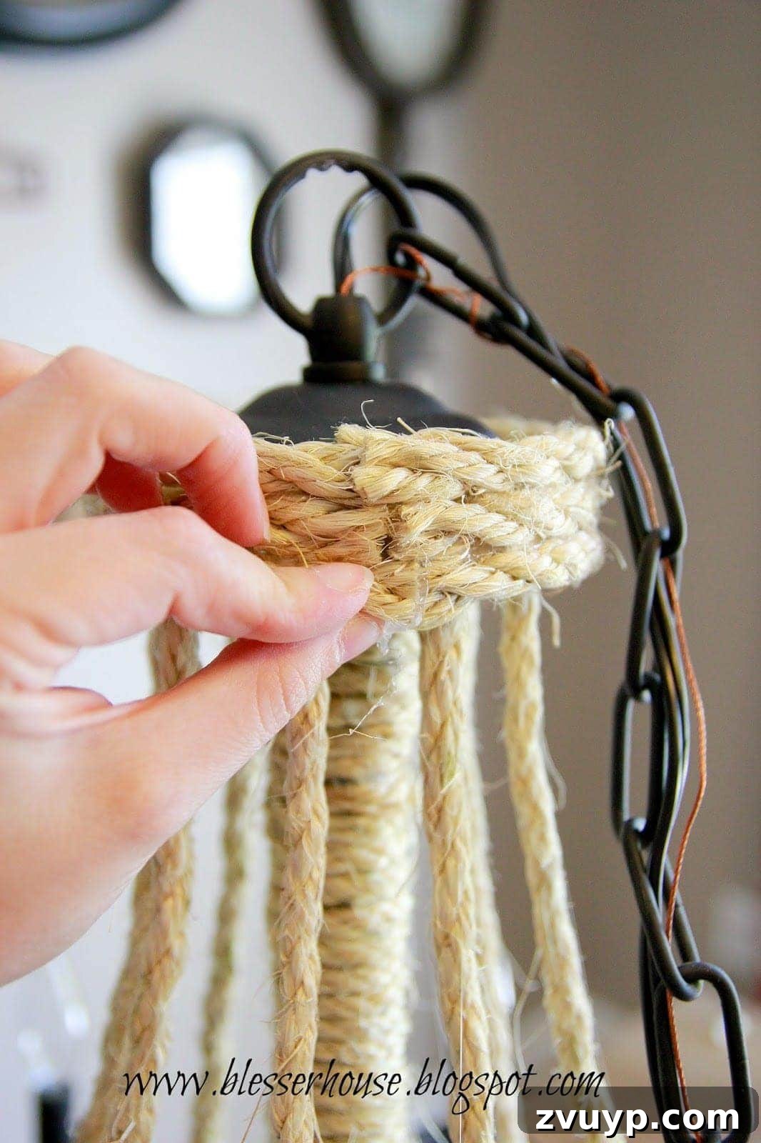 Finishing the top of the rope chandelier with additional wrapping