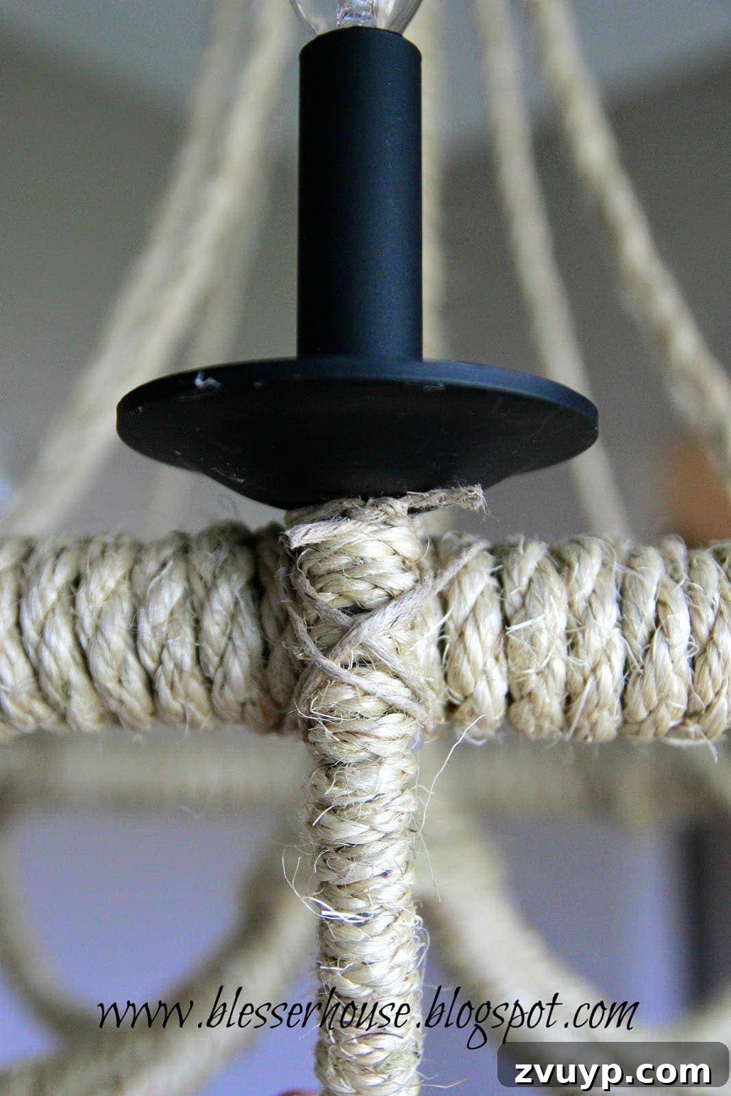Securing rope ends with twine on chandelier arms