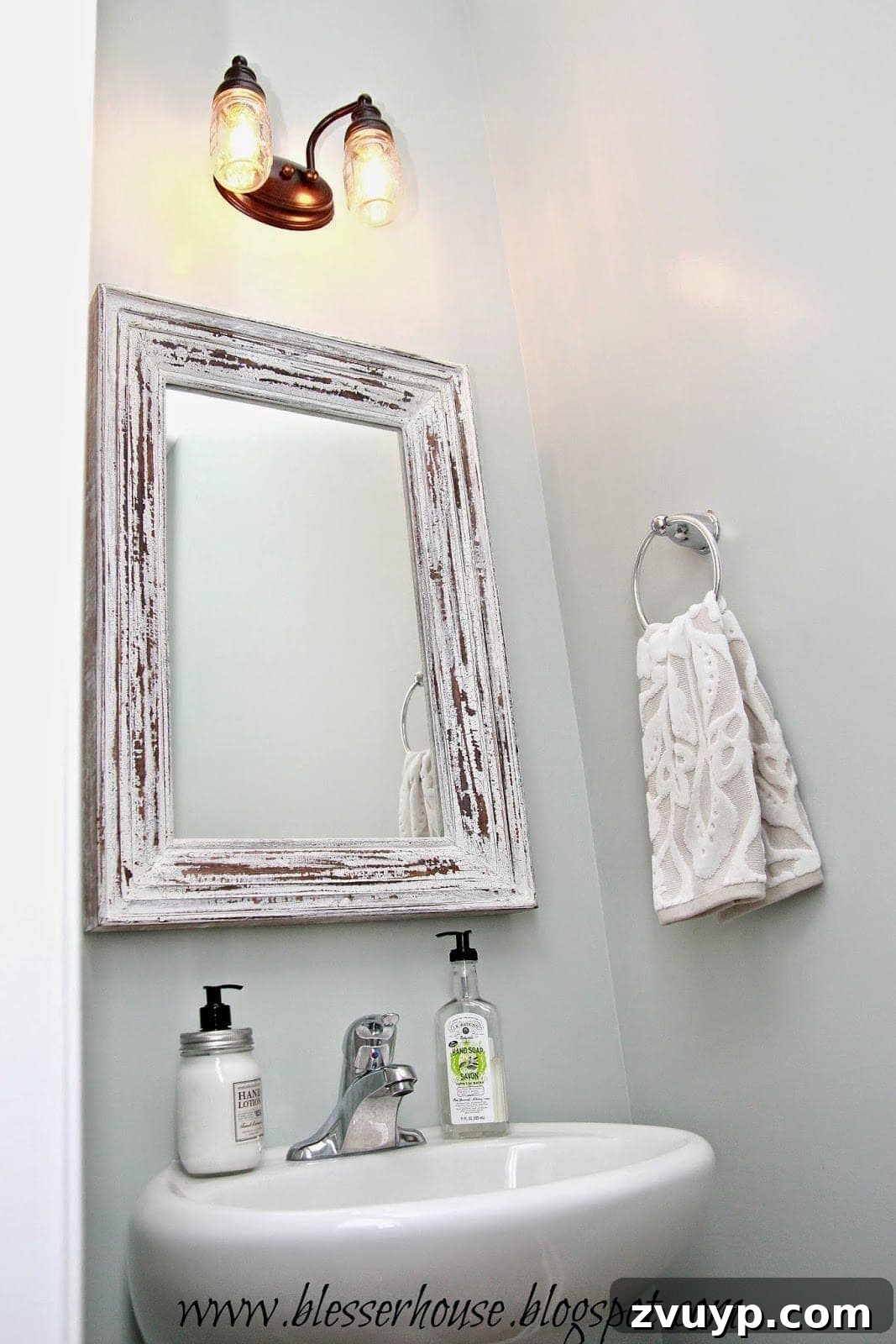 Another view of the farmhouse powder room, highlighting the vanity area and mirror
