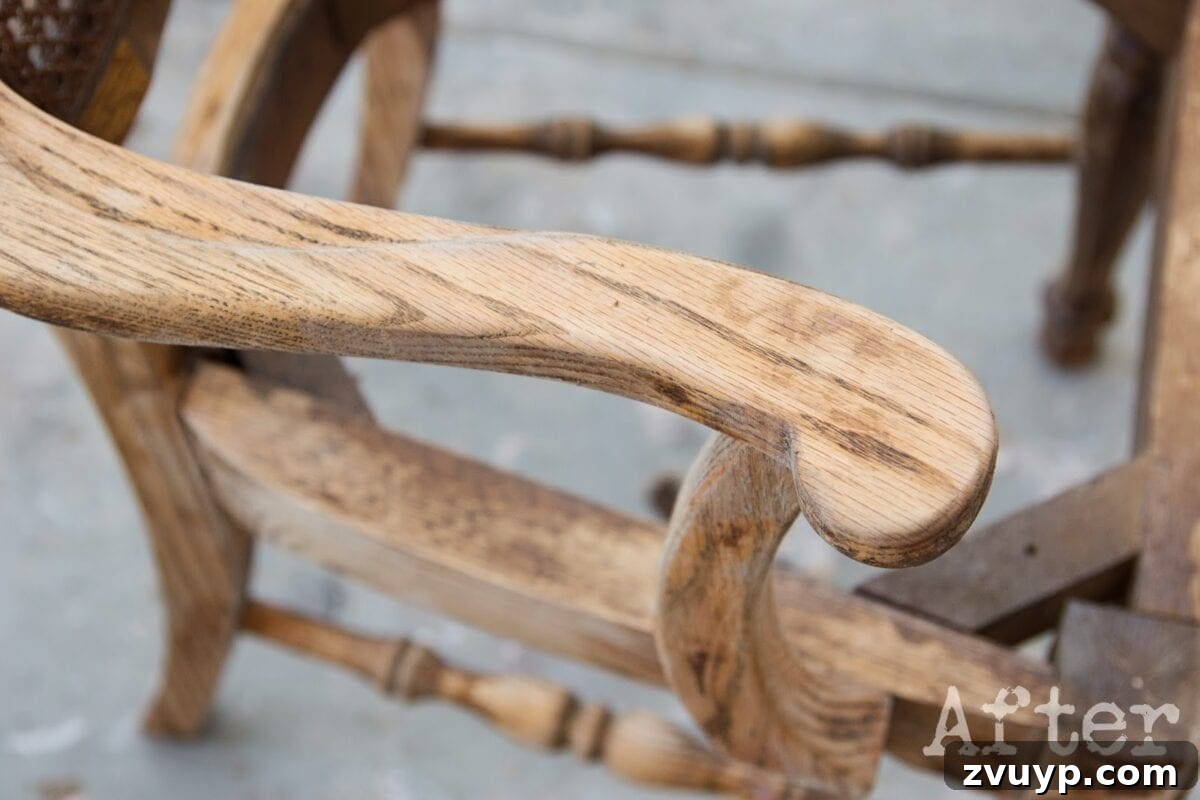 Mastering Citristrip Residue Removal from Wood Furniture 6 After using denatured alcohol to strip wood stain, showing a clean, smooth chair surface completely free of sticky residue.