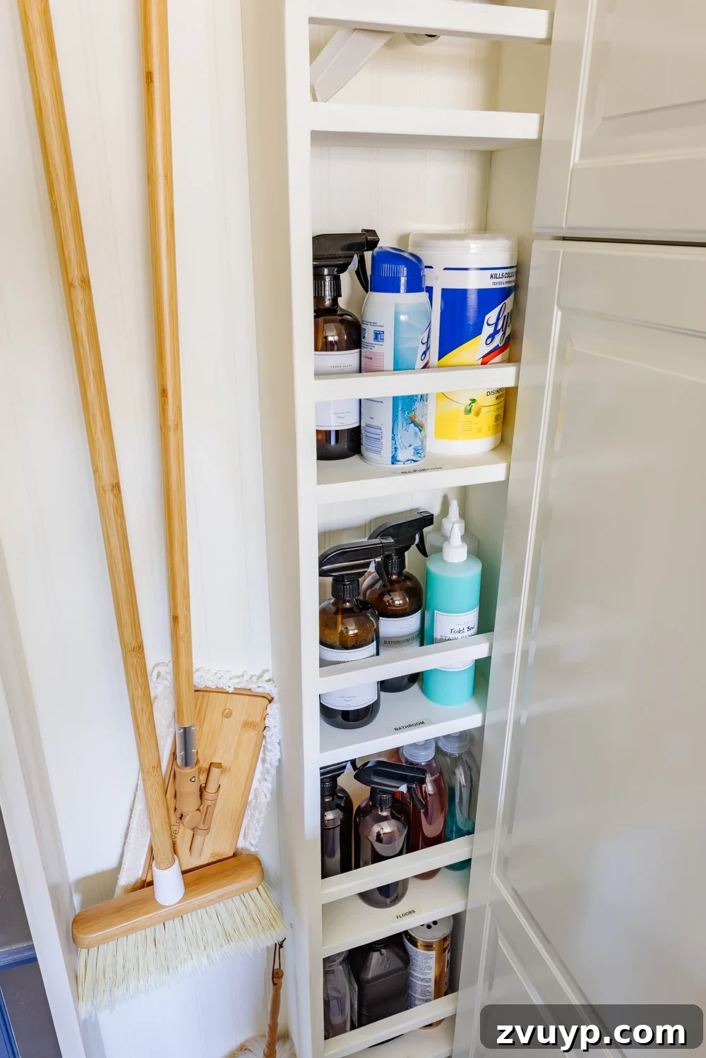 Unlock Hidden Storage in Your Small Laundry Room 13 hidden diy broom cupboard and cleaning supply storage in a laundry room