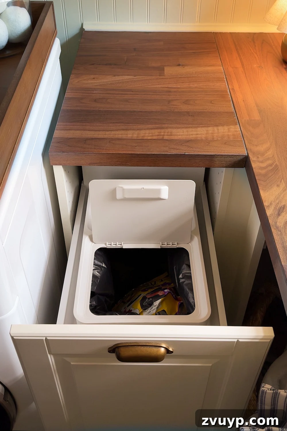 Unlock Hidden Storage in Your Small Laundry Room 14 small laundry room organization - pull out trash can