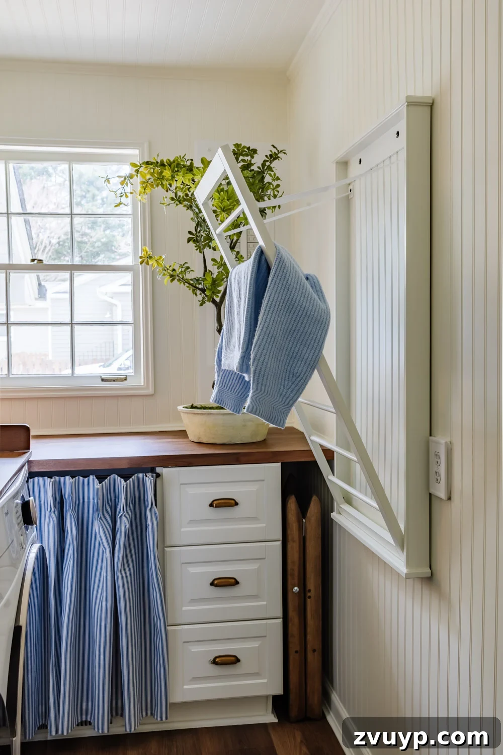 Unlock Hidden Storage in Your Small Laundry Room 19 small laundry room organization - wall mounted drying rack