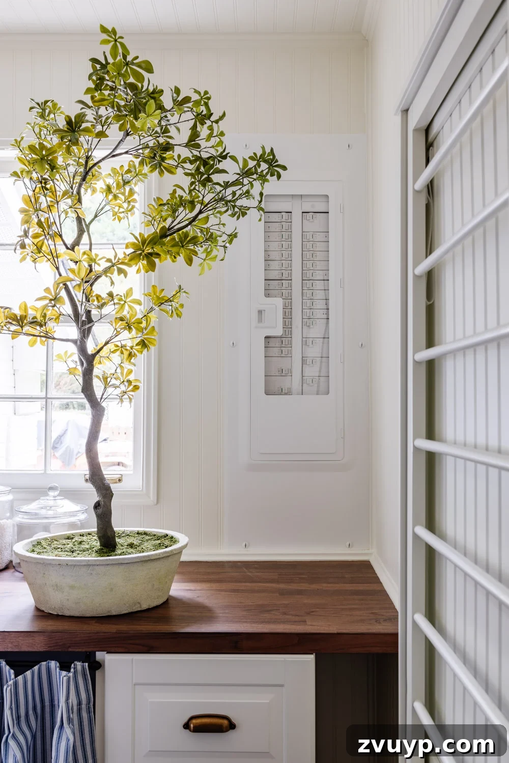 Unlock Hidden Storage in Your Small Laundry Room 24 small laundry room organization - aesthetic electrical panel box