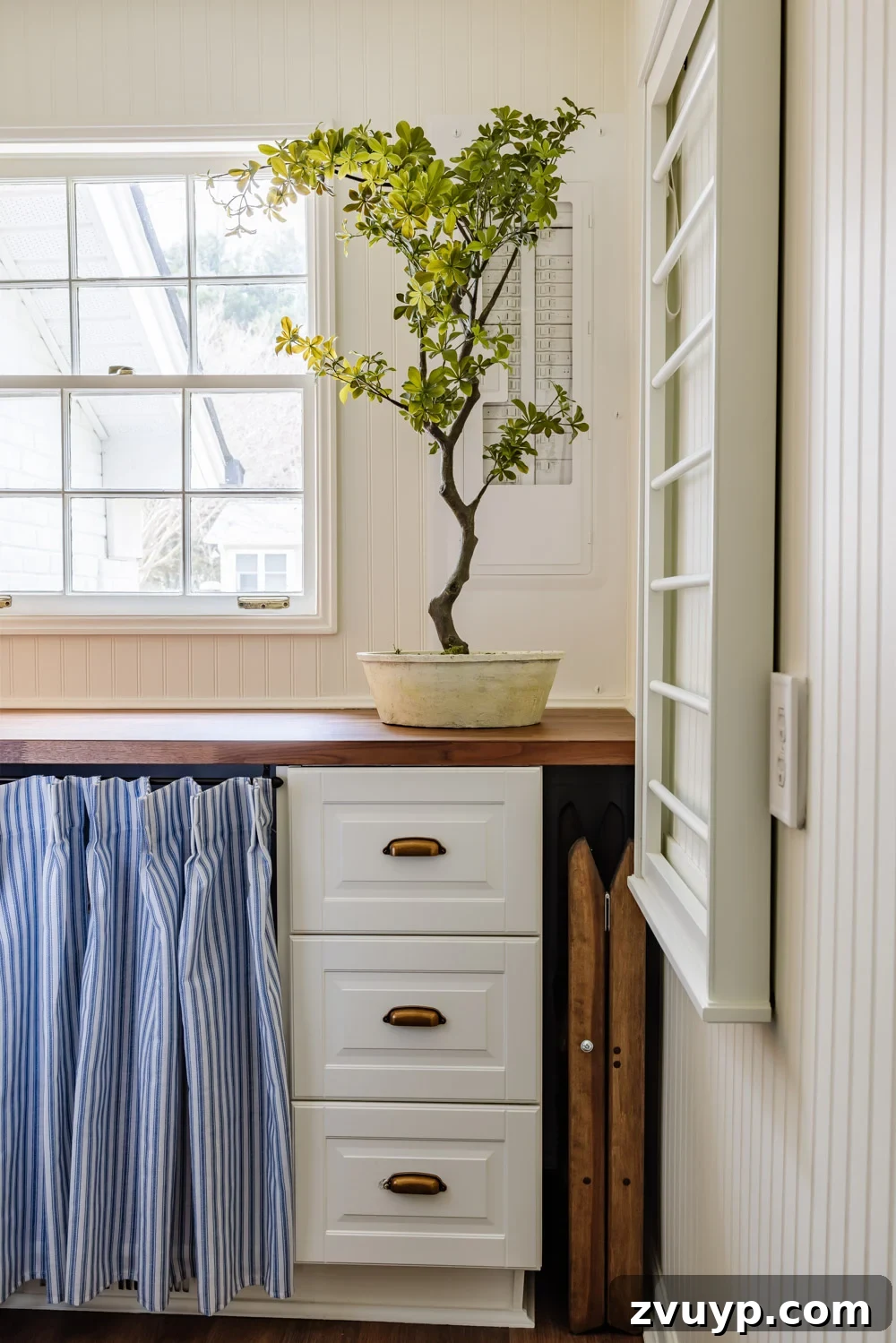 Unlock Hidden Storage in Your Small Laundry Room 25 small laundry room organization - step stool storage