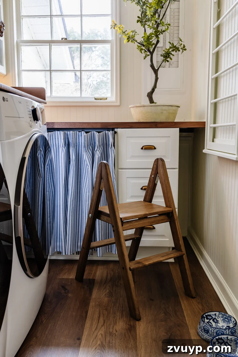 Unlock Hidden Storage in Your Small Laundry Room 26 small laundry room organization - folding step stool