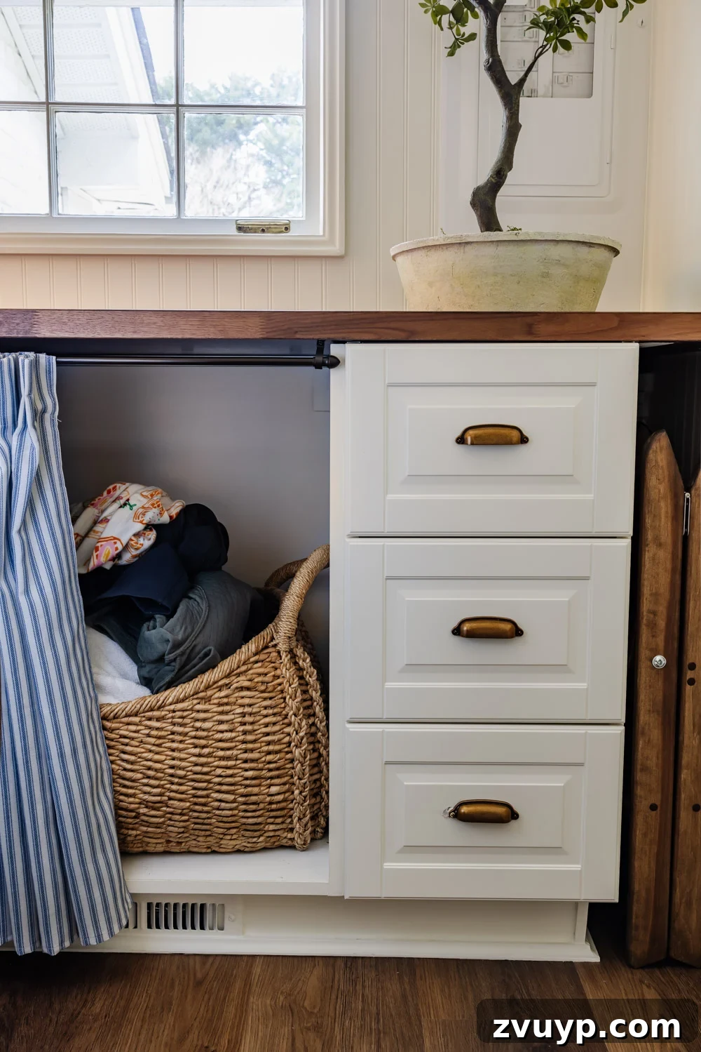 Unlock Hidden Storage in Your Small Laundry Room 9 small laundry room organization - hamper basket covered by under countertop skirt