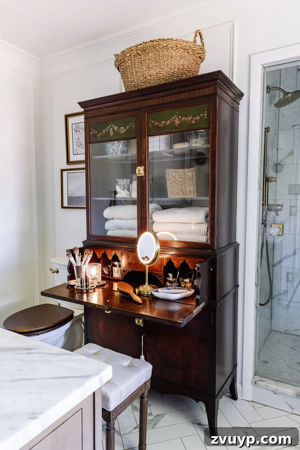 Secretary Desk Transformation: DIY Makeup Vanity for Small Bathrooms 3 Secretary desk functioning as a stylish makeup vanity with closed compartments, showcasing excellent small bathroom storage