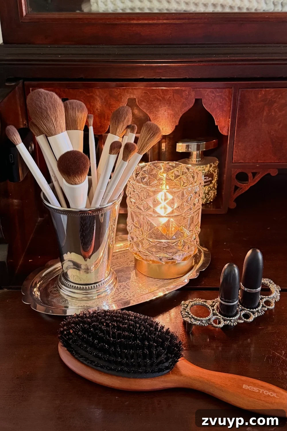 Secretary Desk Transformation: DIY Makeup Vanity for Small Bathrooms 8 Organized secretary desk top cabinet featuring folded waffle towels and decorative chinoiserie jar.