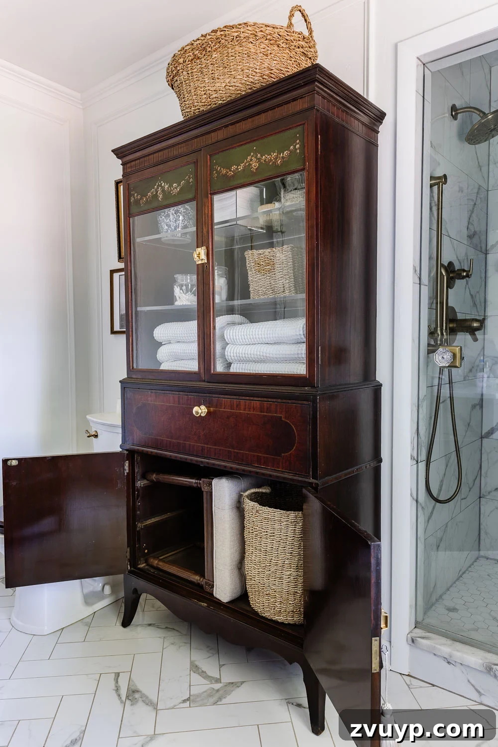 Secretary Desk Transformation: DIY Makeup Vanity for Small Bathrooms 9 Open secretary desk functioning as a makeup vanity with mirror, brushes, and makeup organized inside.