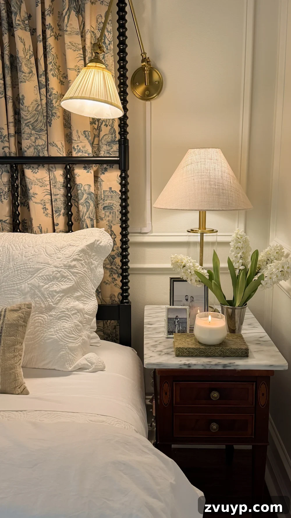 Layer Lighting Like an Interior Designer: Tips for Every Room 3 classic modern french country bedroom with layered lighting and canopy bed