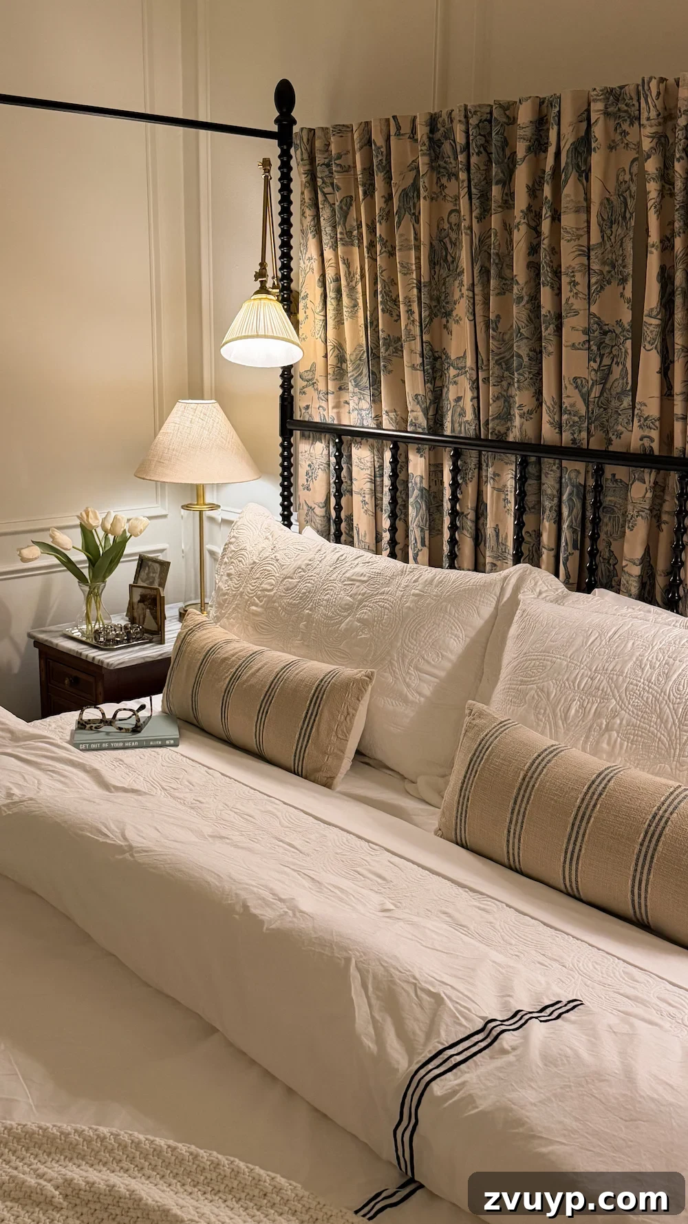 Layer Lighting Like an Interior Designer: Tips for Every Room 5 classic modern french country bedroom with layered lighting and canopy bed