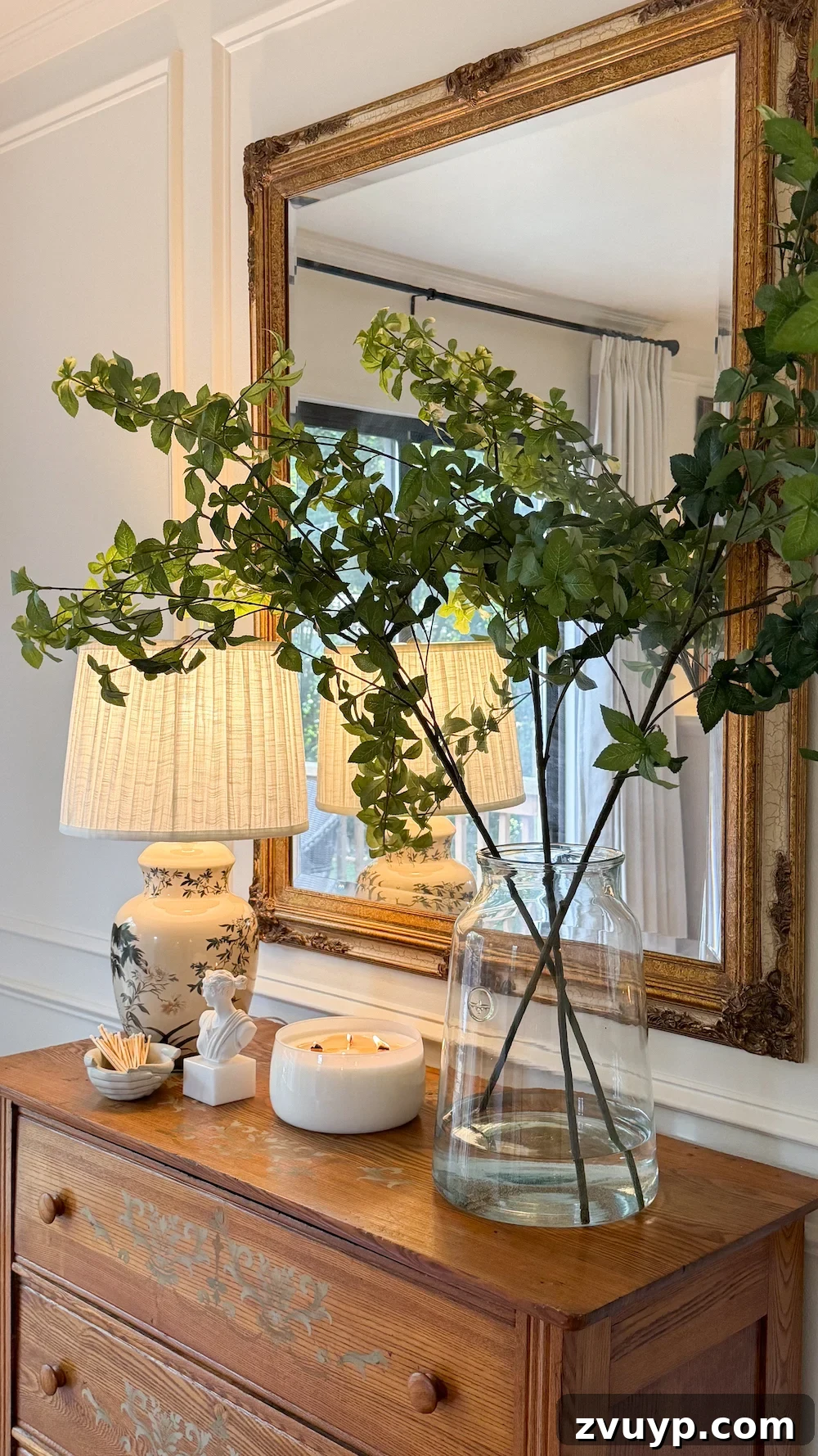 Layer Lighting Like an Interior Designer: Tips for Every Room 8 classic modern french country bedroom with layered lighting and canopy bed
